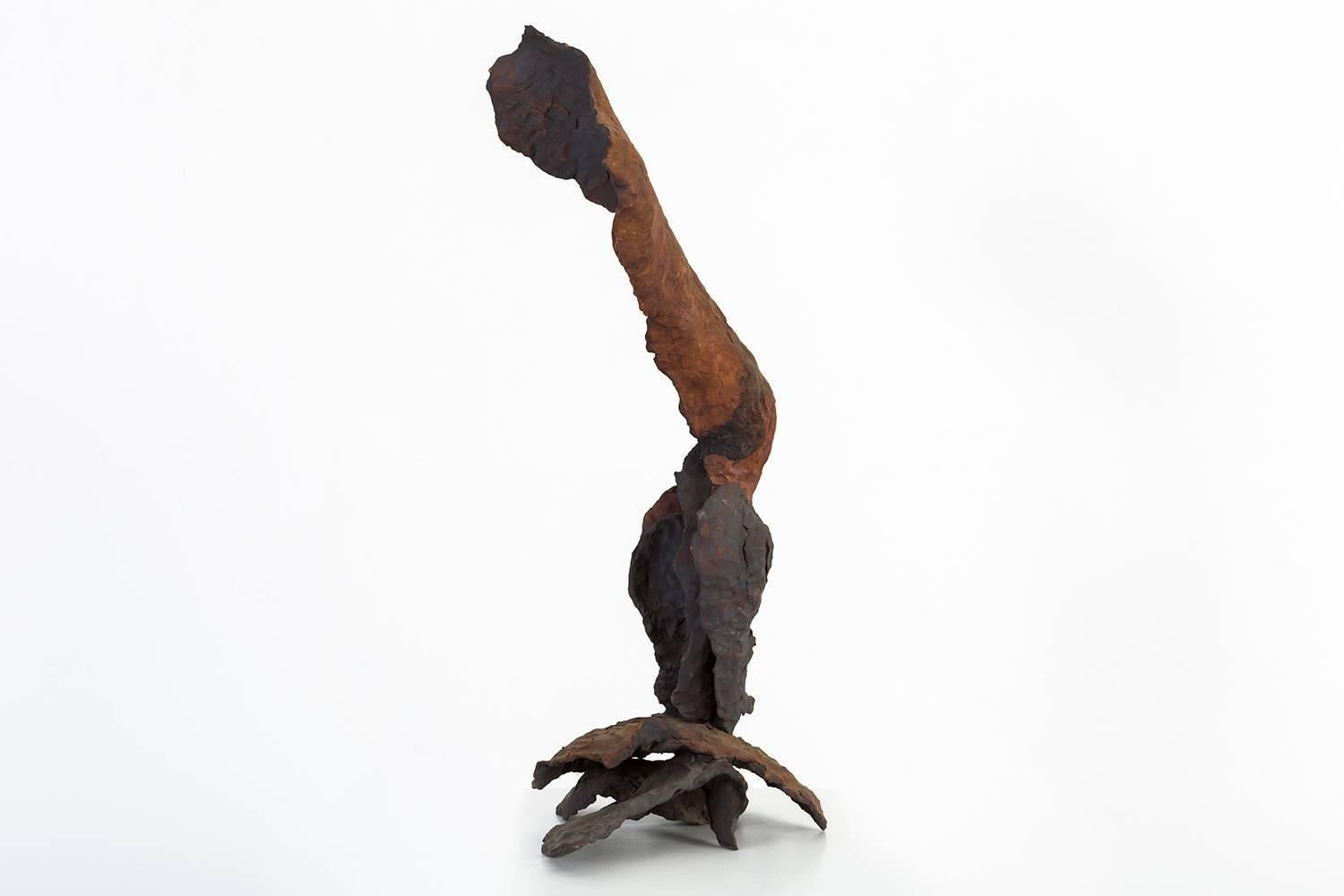 A beautifully sculpted stoneware leg takes a firm, yet feminine stance in Ruth Aizuss Migdal’s “Standing Tall”. Different tones and texture of the medium contribute to the complexity and depth of this piece.

Through a puzzle-like assembly of