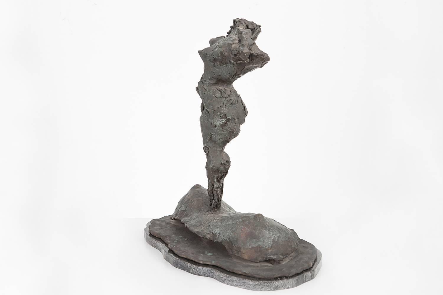 This sculpture by Ruth Aizuss Migdal depicts a vertical, nude figure on a solid base, both made of bronze. “Venus Rising” embodies feminine strength through the sturdiness of the bronze and curved shape and posture of the nude figure. 

Through a