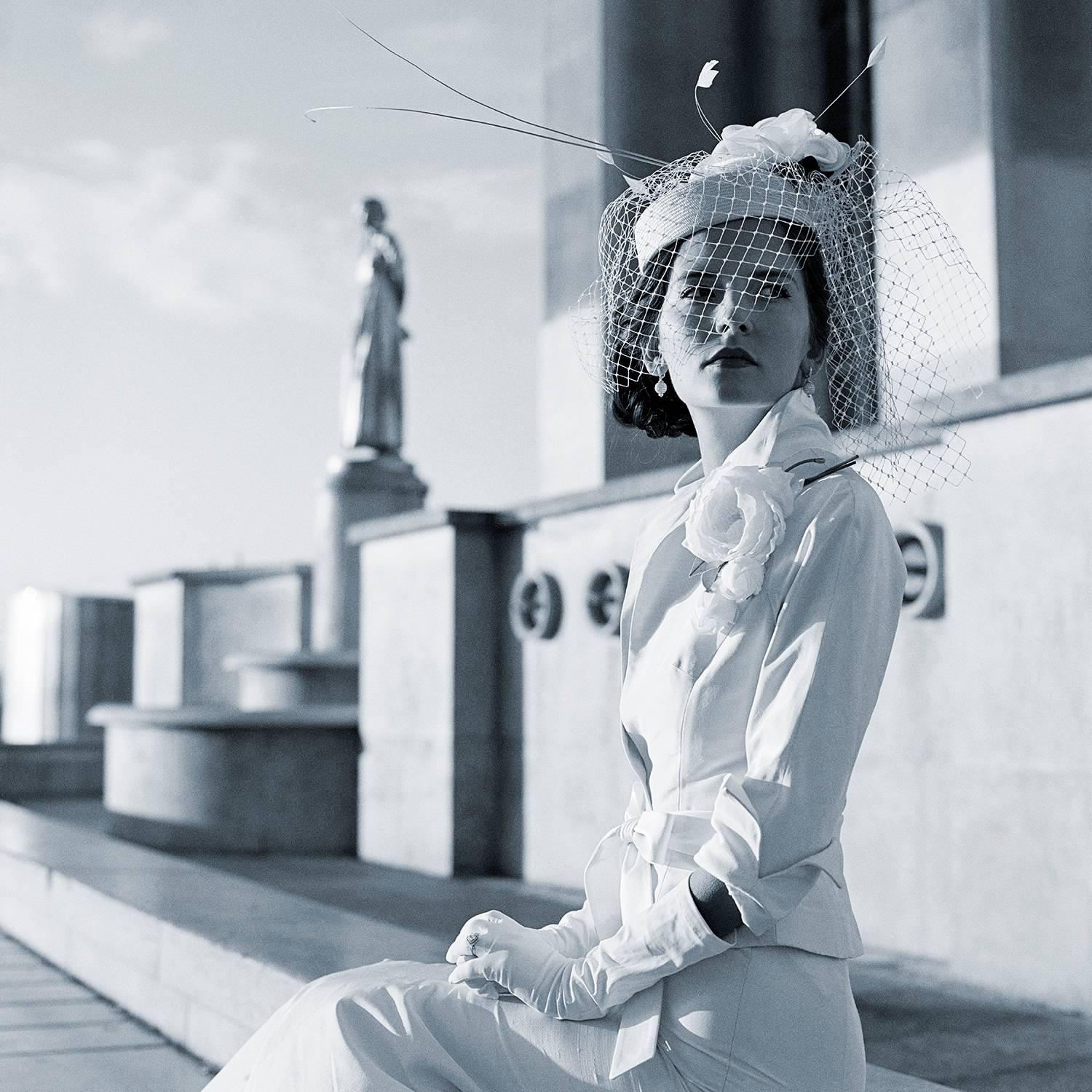 Rodney Smith Black and White Photograph - Mira Seated in Trocadero, Paris, France-20 x 20 inch black and white photograph