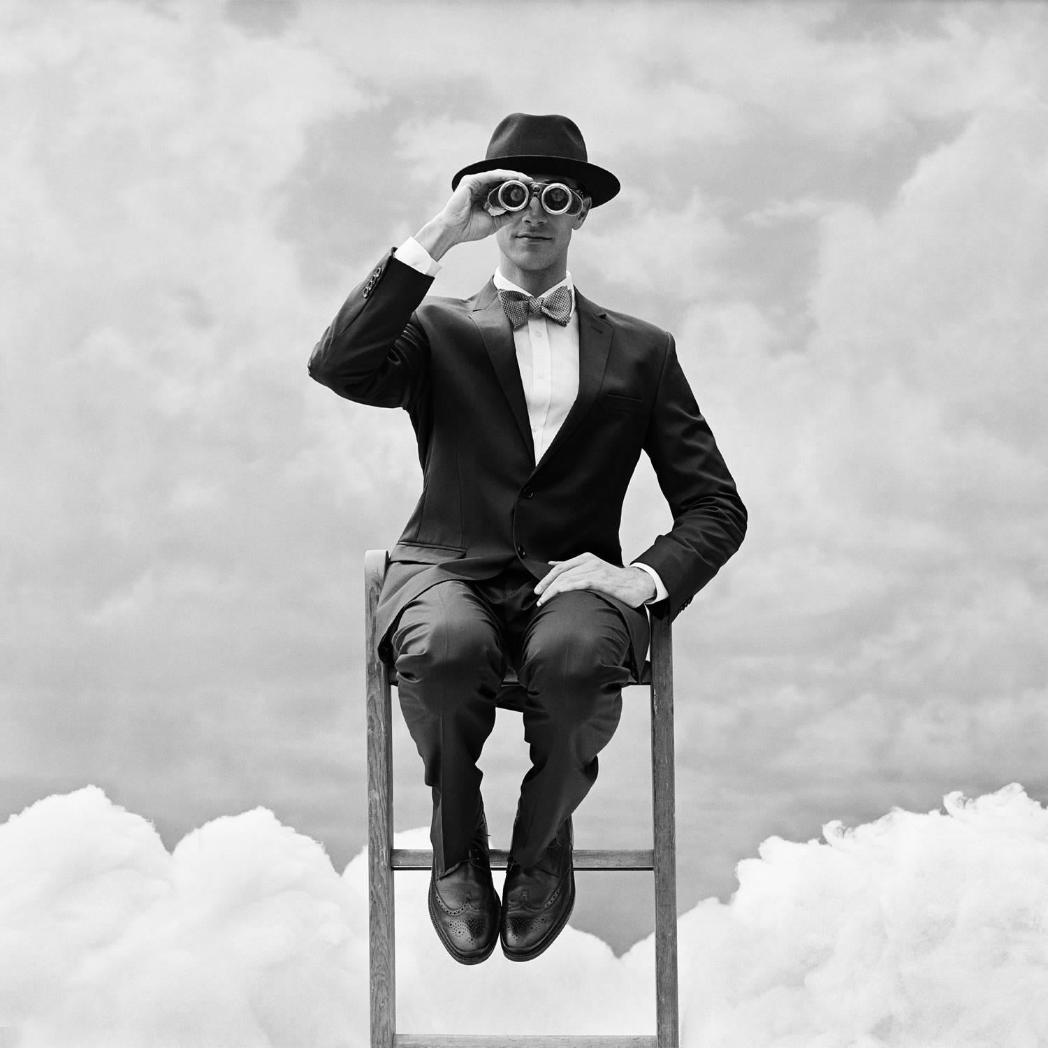 Rodney Smith Black and White Photograph - Reed Perched on the top of Ladder with Binoculars, Snedens Landing, NY