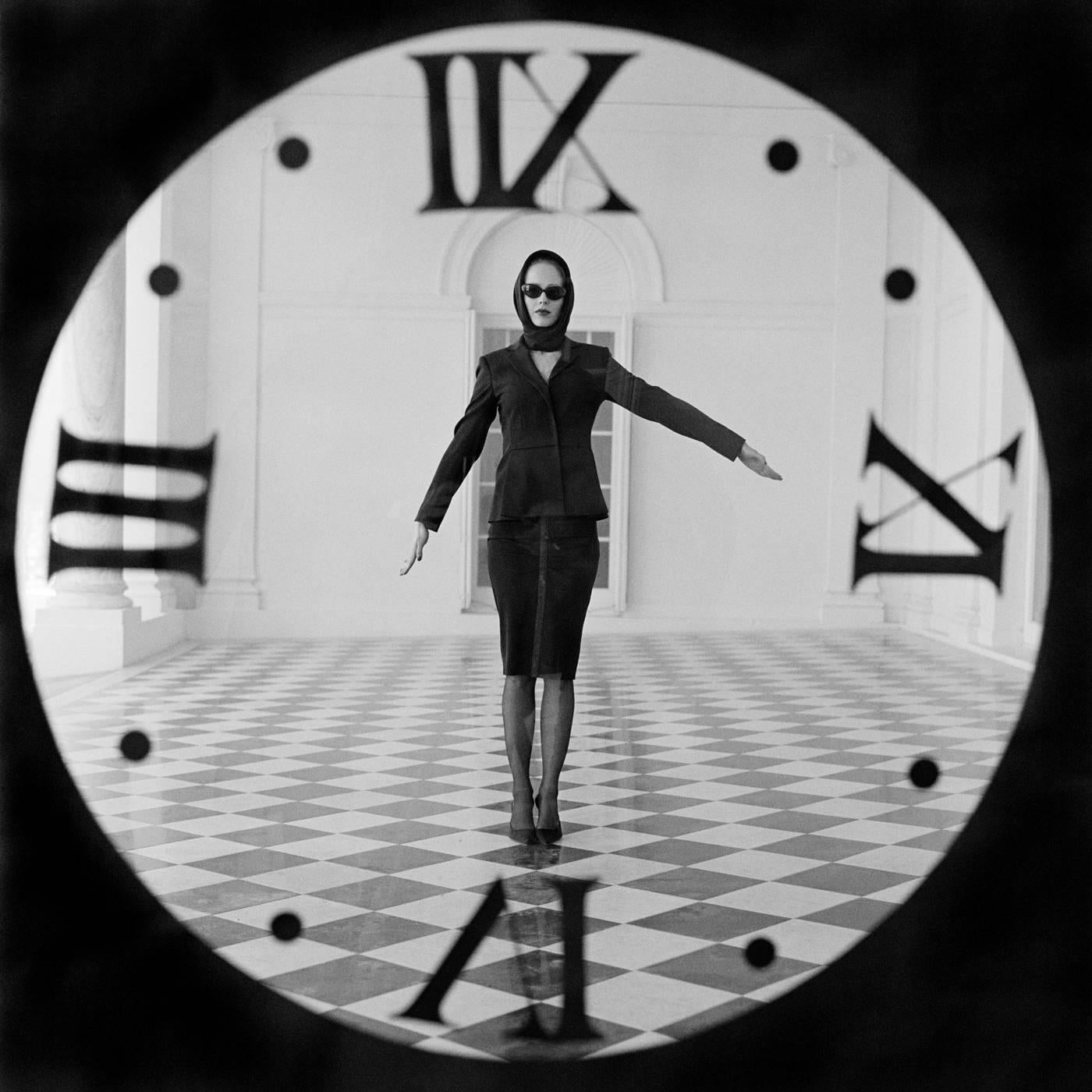 Rodney Smith Black and White Photograph - Viktoria Through Clock, Rhinebeck, NY - 20 x 20 inches