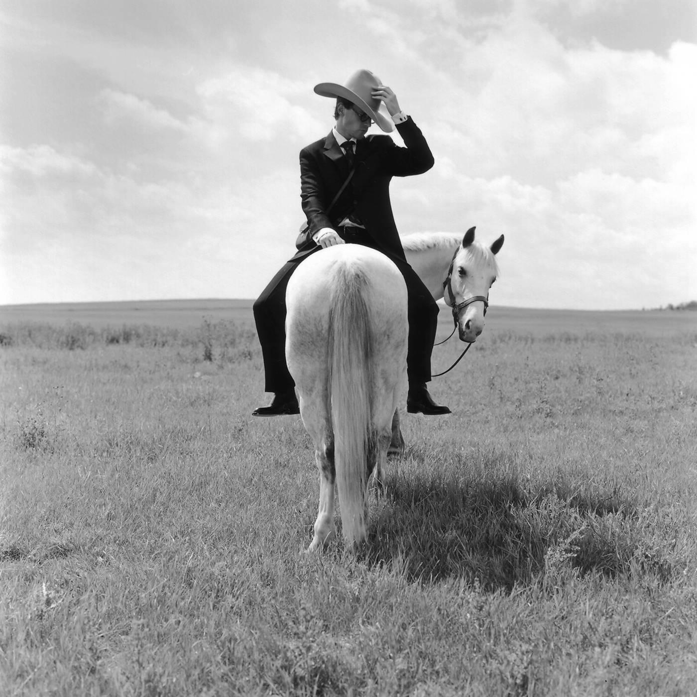 Rodney Smith Black and White Photograph - Greg on Horse Backwards, Alberta, Canada - 20 x 20 inches