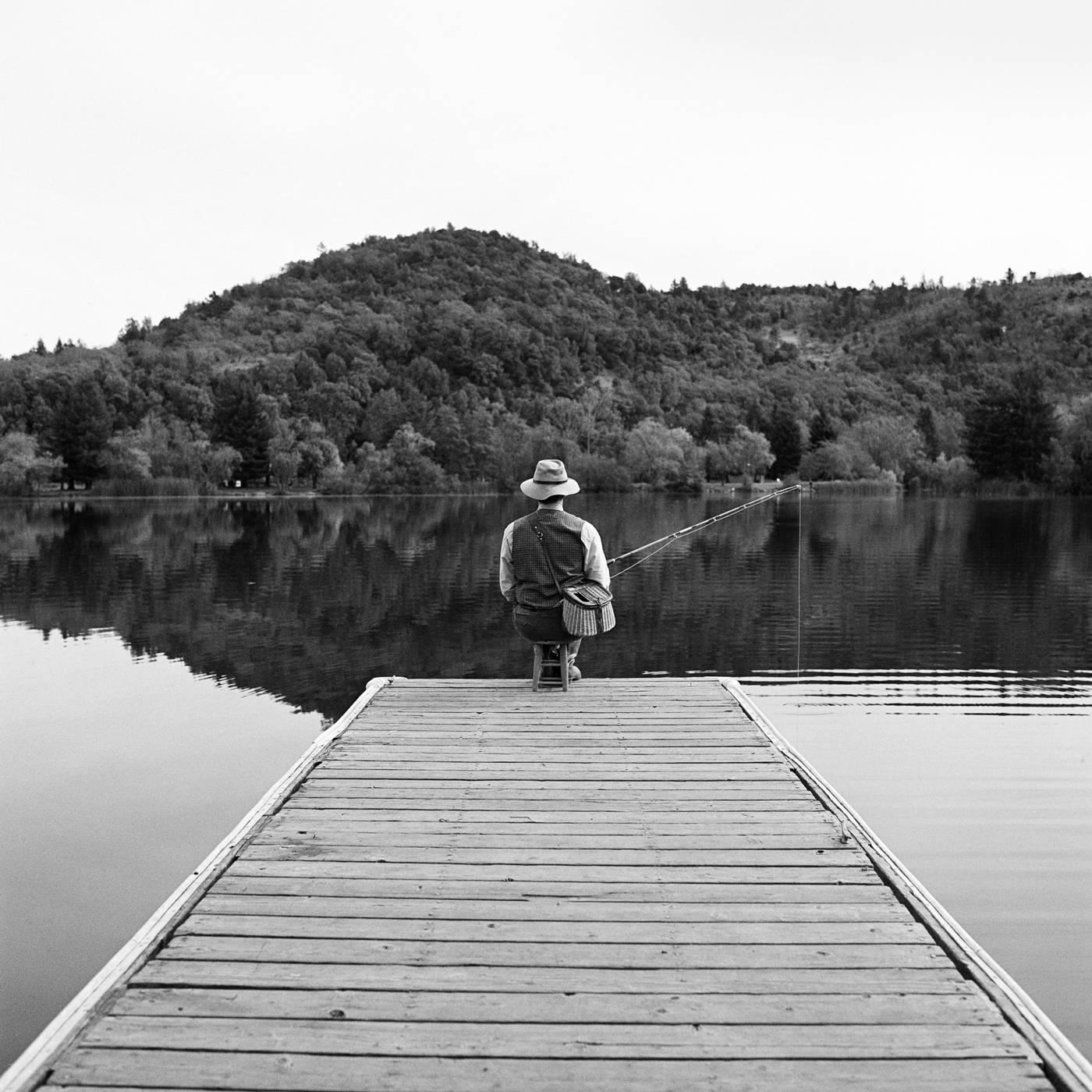 Rodney Smith Figurative Photograph - Terry Fishing at End of Dock, Santa Rosa , CA