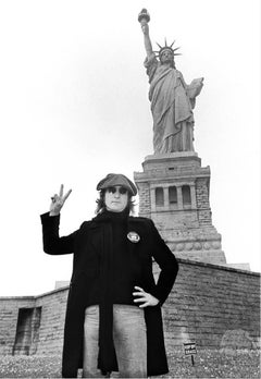 John Lennon, Statue of Liberty, 1974 by Bob Gruen