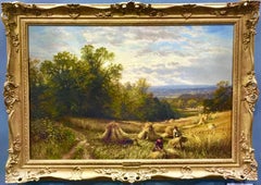 English Harvest scene with corn stacks and wild flowers