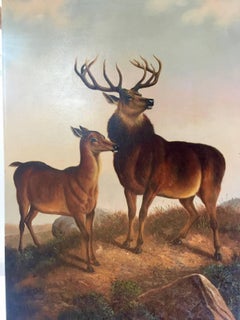 Vintage Scottish scene of a stag and  deer in an Extensive Highland landscape