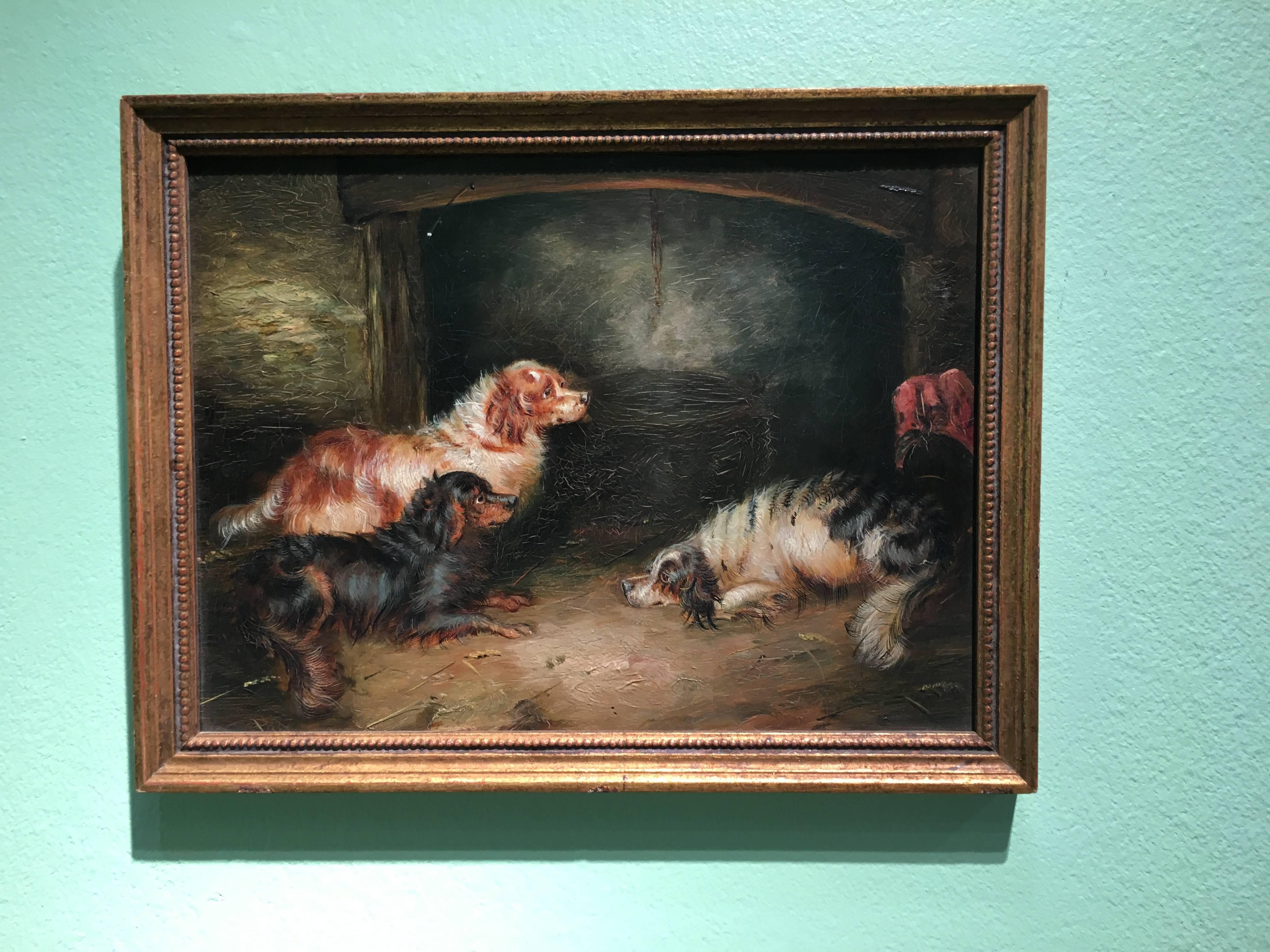 George Armfield Interior Painting - Three English Spaniels seated in a Victorian Interior