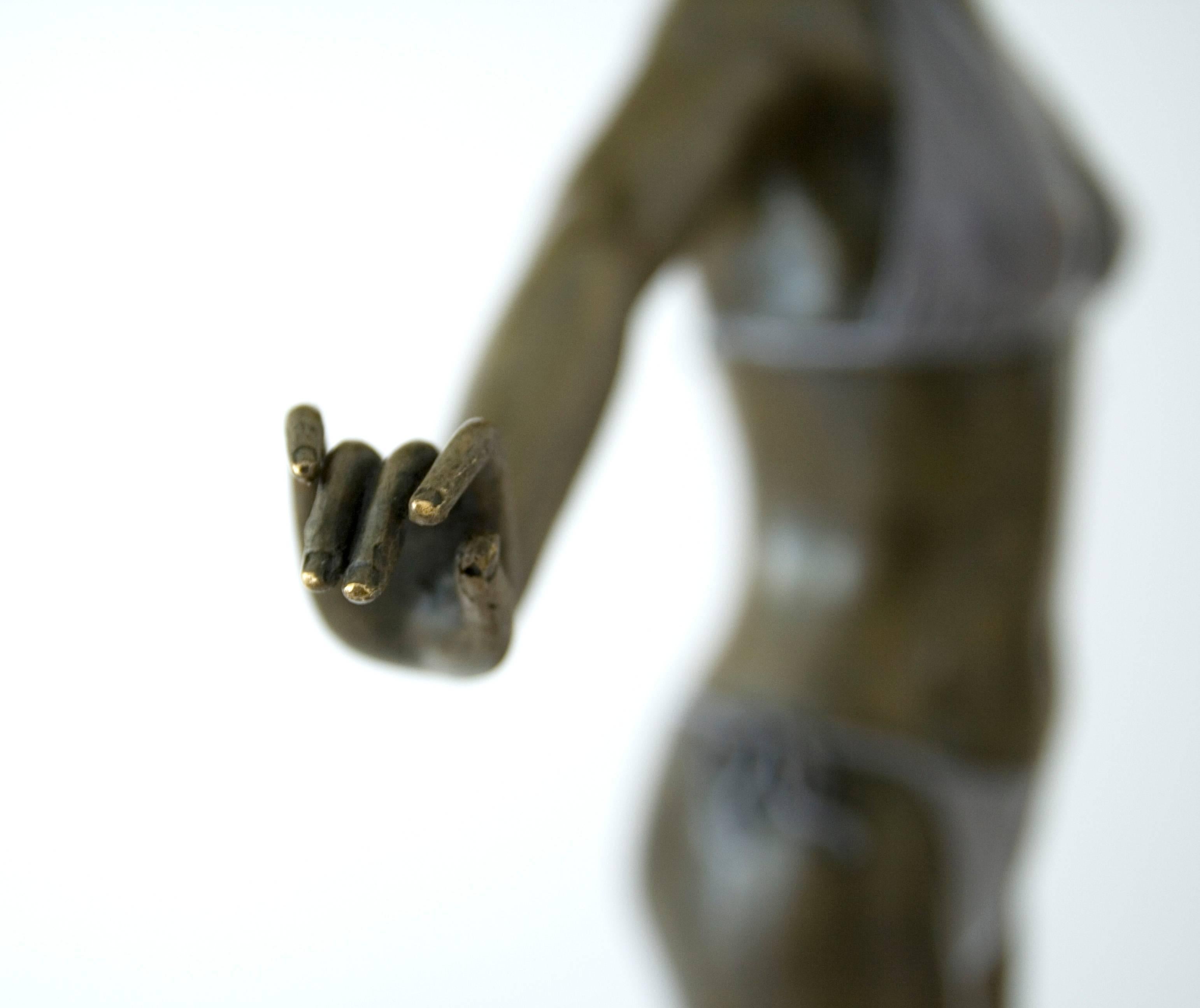 standing woman sculpture