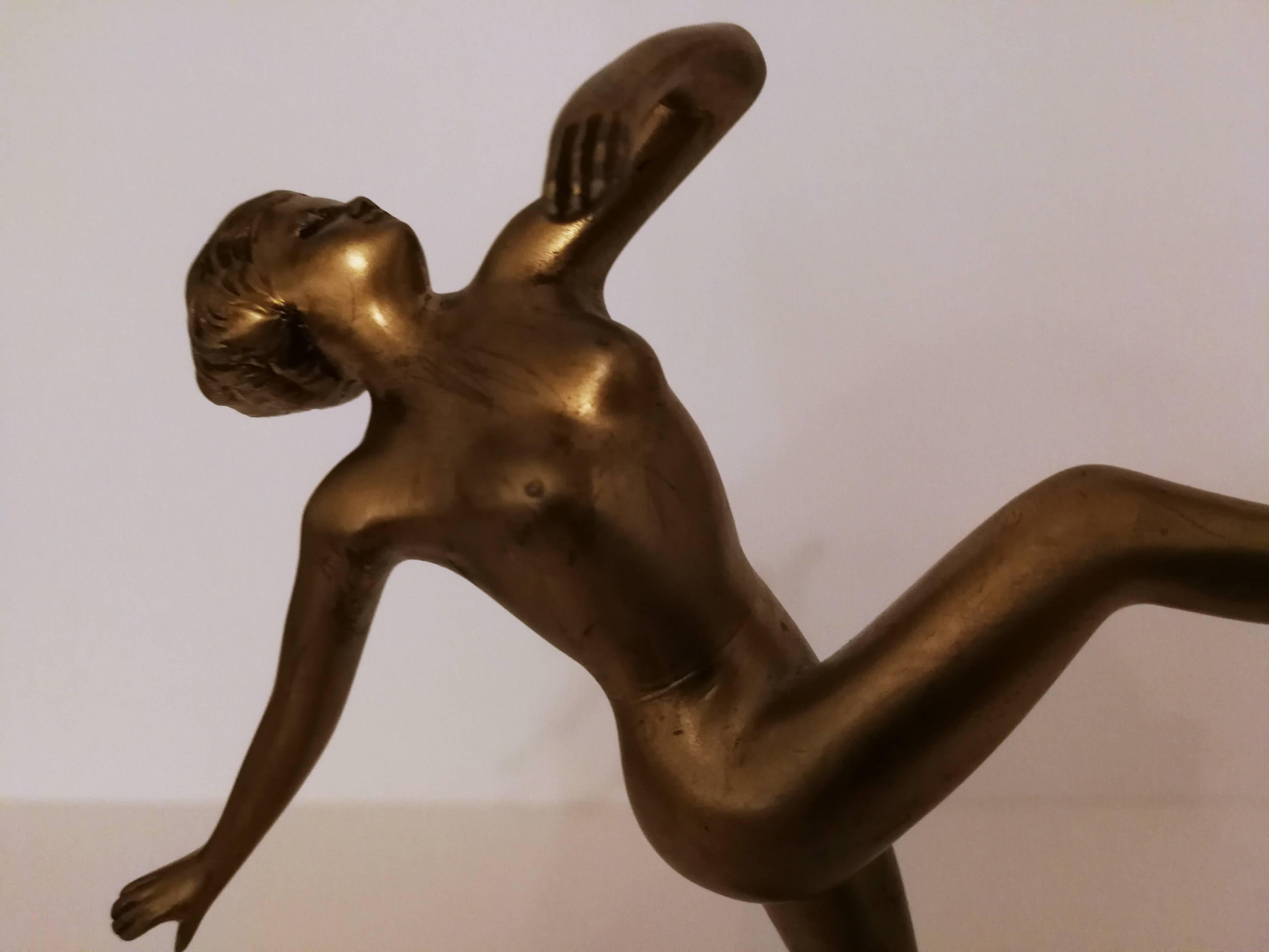 Tänzerin mit erhobenem Bein (Dancer with raised leg) - Gold Nude Sculpture by Josef Lorenzl