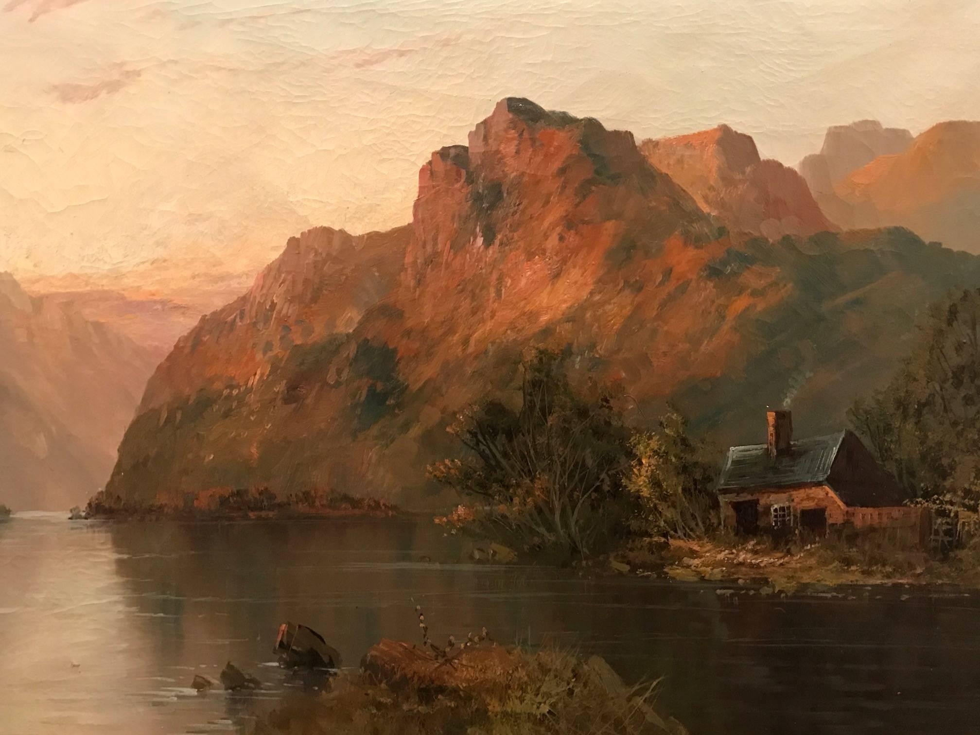Magnificent large scale antique oil painting depicting this beautiful Scottish Highlands loch scene as the sun sets on the day. 

Warm, golden colours flood the landscape as the ancient rugged mountains tower over the calm loch waters and old