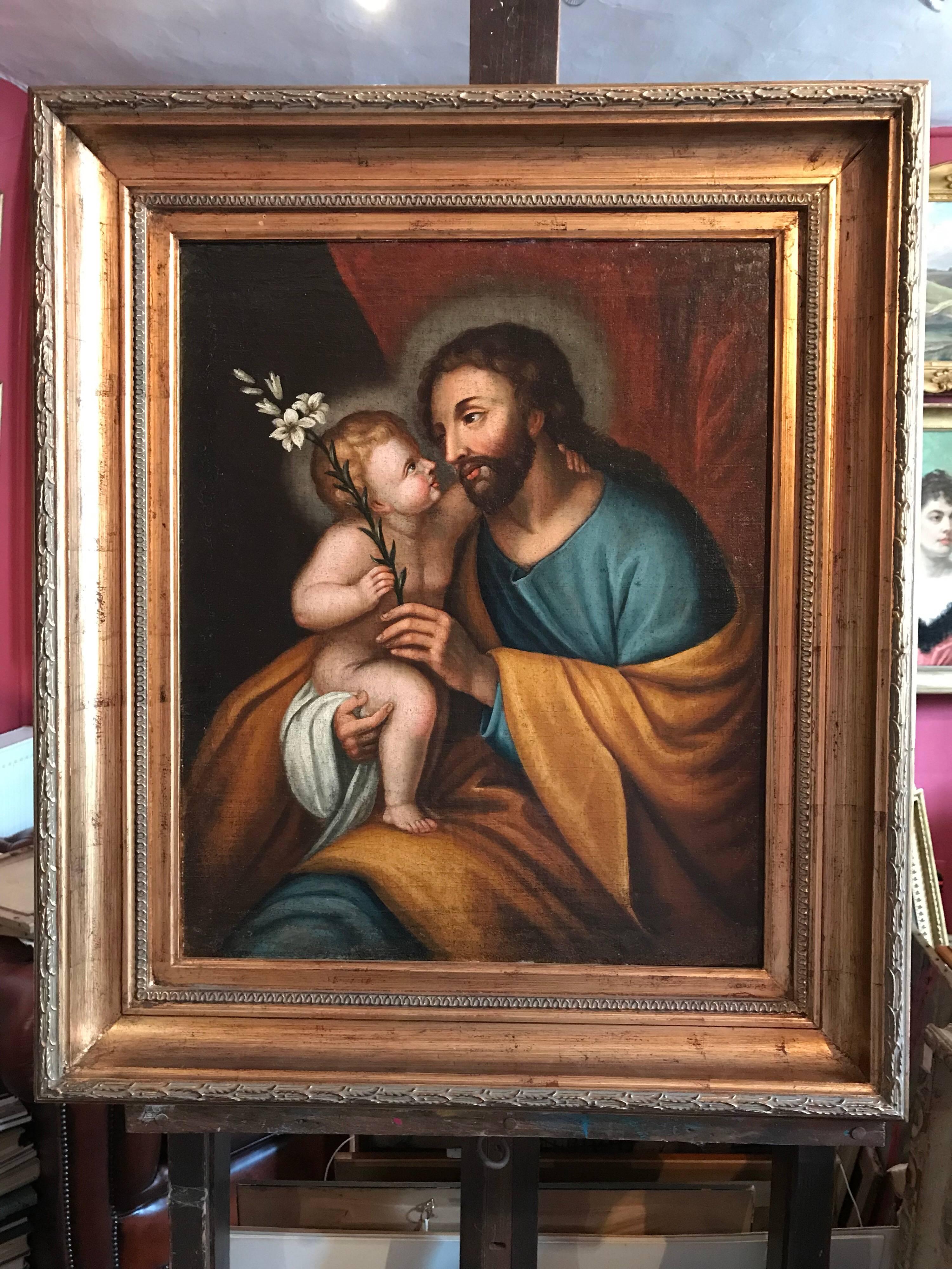 Joseph & Infant Christ Child, 17th century Old Master oil painting - Old Masters Painting by Unknown