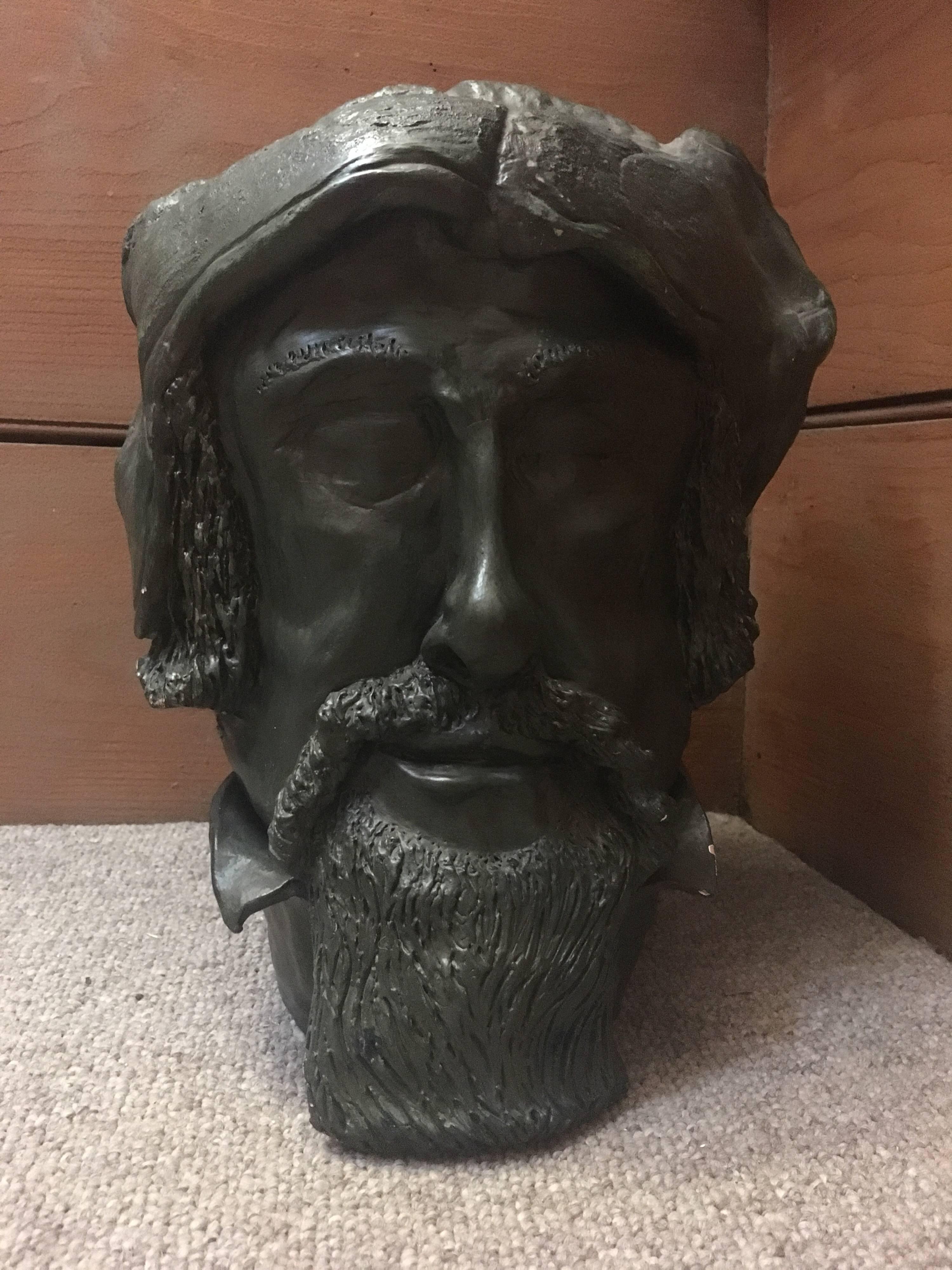 sculpture of beard man