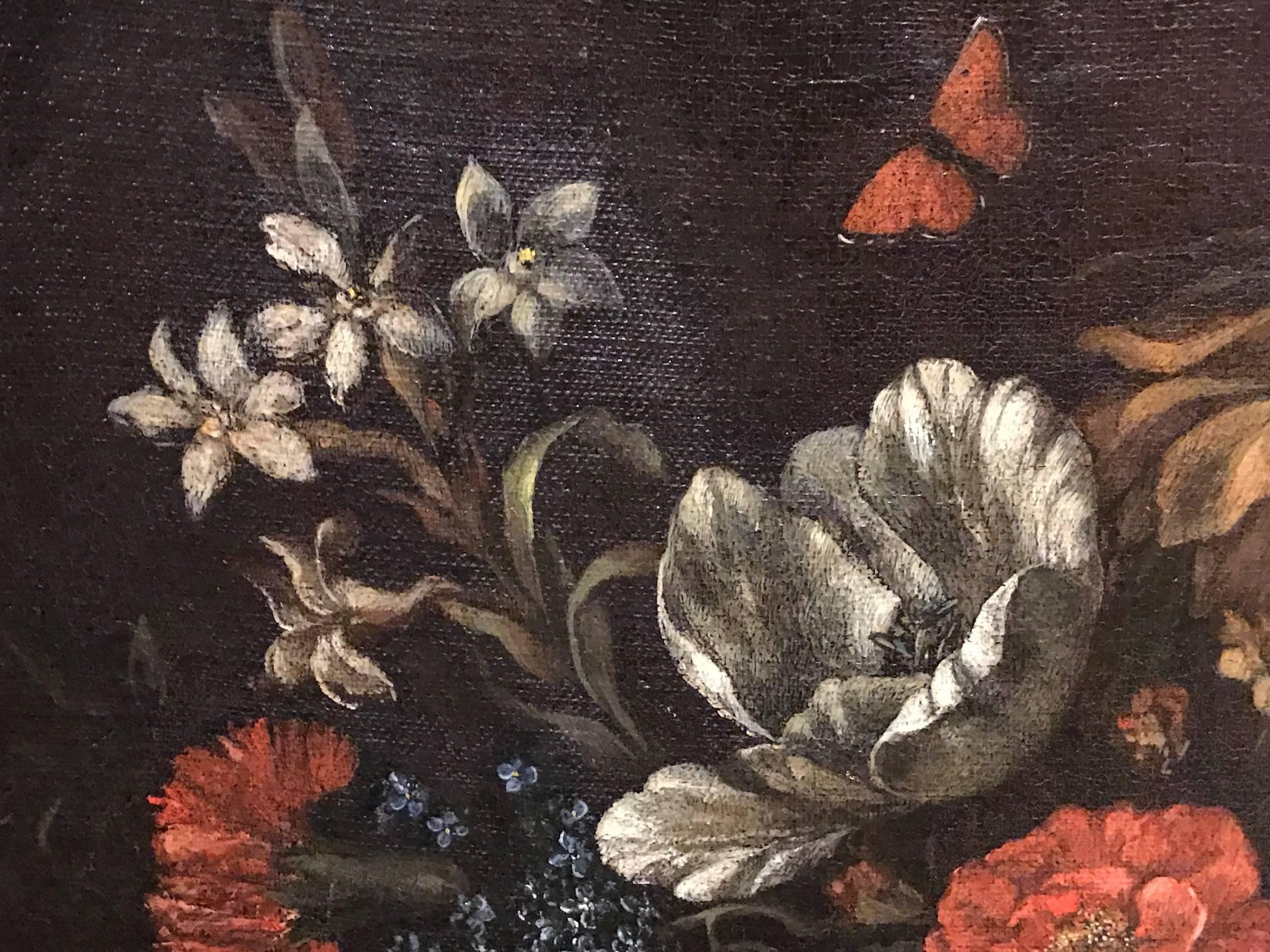 Fine quality Flemish School oil painting depicting this elegant still life floral composition. The work dates to the 17th century and is typical of the Baroque movement. 

Early Flemish and Dutch flowers paintings become popular with the