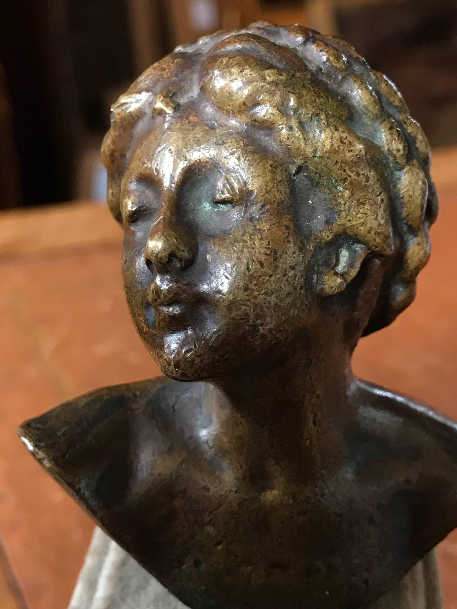 Brass Busy Portrait of Lady with Braided Hair - mounted on felt plinth 1