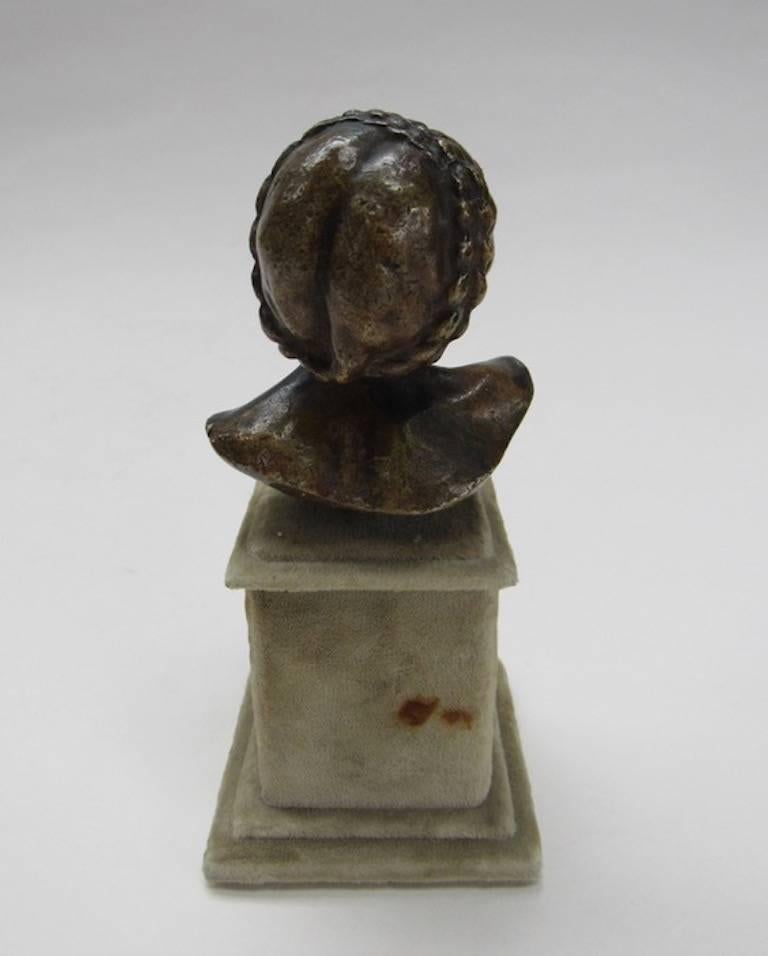 Brass Busy Portrait of Lady with Braided Hair - mounted on felt plinth - Brown Figurative Sculpture by Unknown