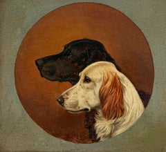 Two Sporting Spaniel Portraits in Profile Against a Circular Ground British Oil