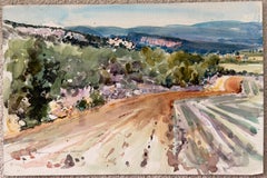 Towards Saint Saturnin French Country Road Through Fields and Hills Landscape