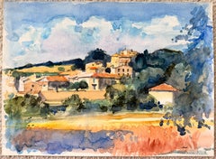 Sunlit French Hilltop Village with Red Roofs and Golden Fields French Landscape