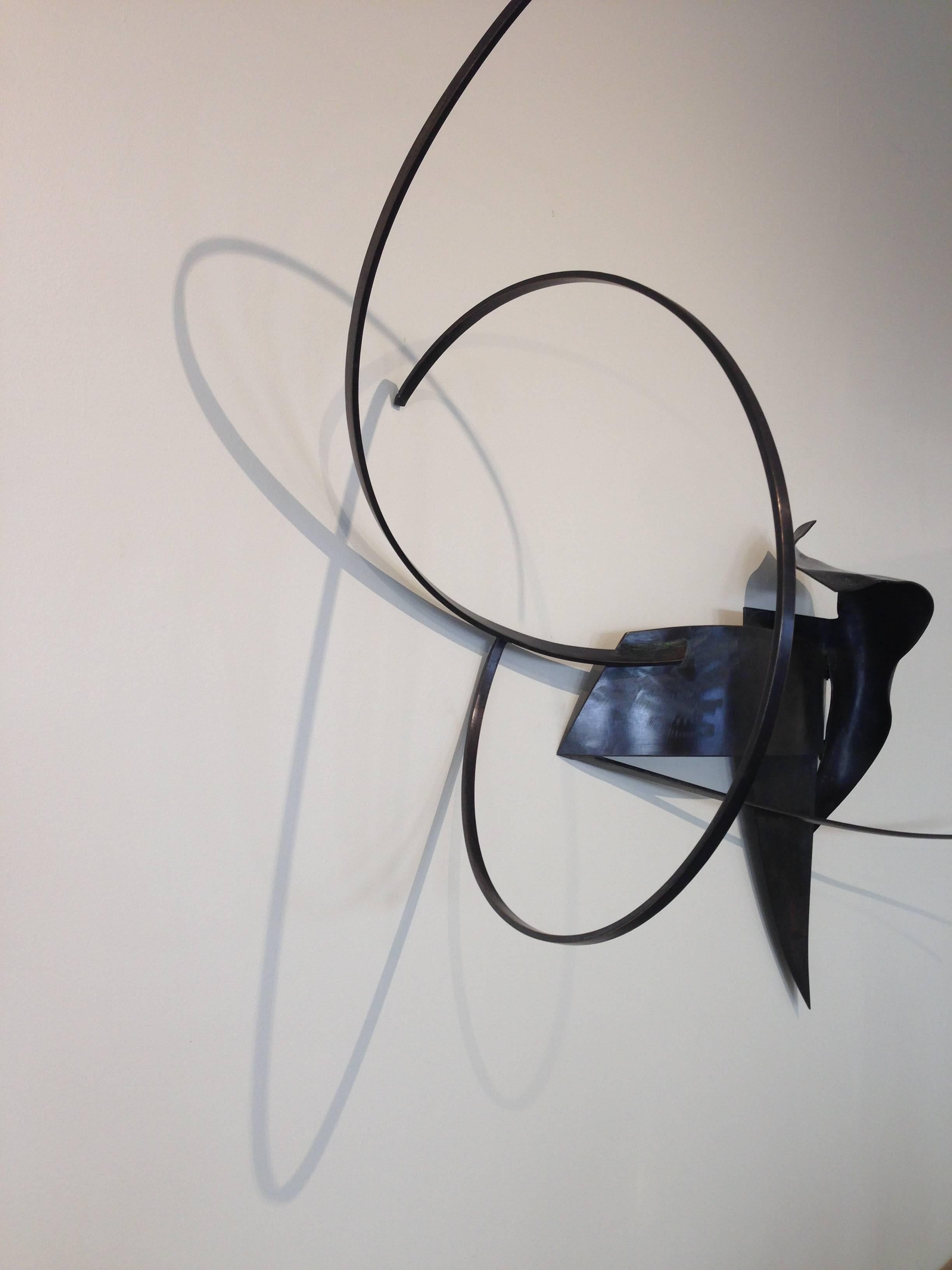 Why Miss Lunch?, metal wall sculpture, oxidized brass and bronze.
Born in the Netherlands in 1959, and raised in Cambridge, MA, Joe Wheaton is primarily a sculptor. He studied fine art at Alfred University and has worked in a variety of media