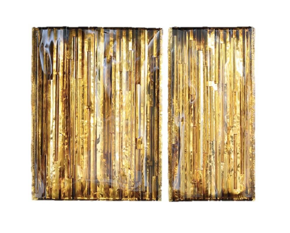 Gold colored wall art consisting of two items. This magnificent decorative wall art is created by emerging artist Pleunie Buyink. This item comes with a “Certificate of Authenticity” issued by the artist.  Pleunie Buyink is a graduate from the