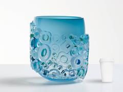 Murano glass style blue vase. Blue blown glass vessel with glass ornaments