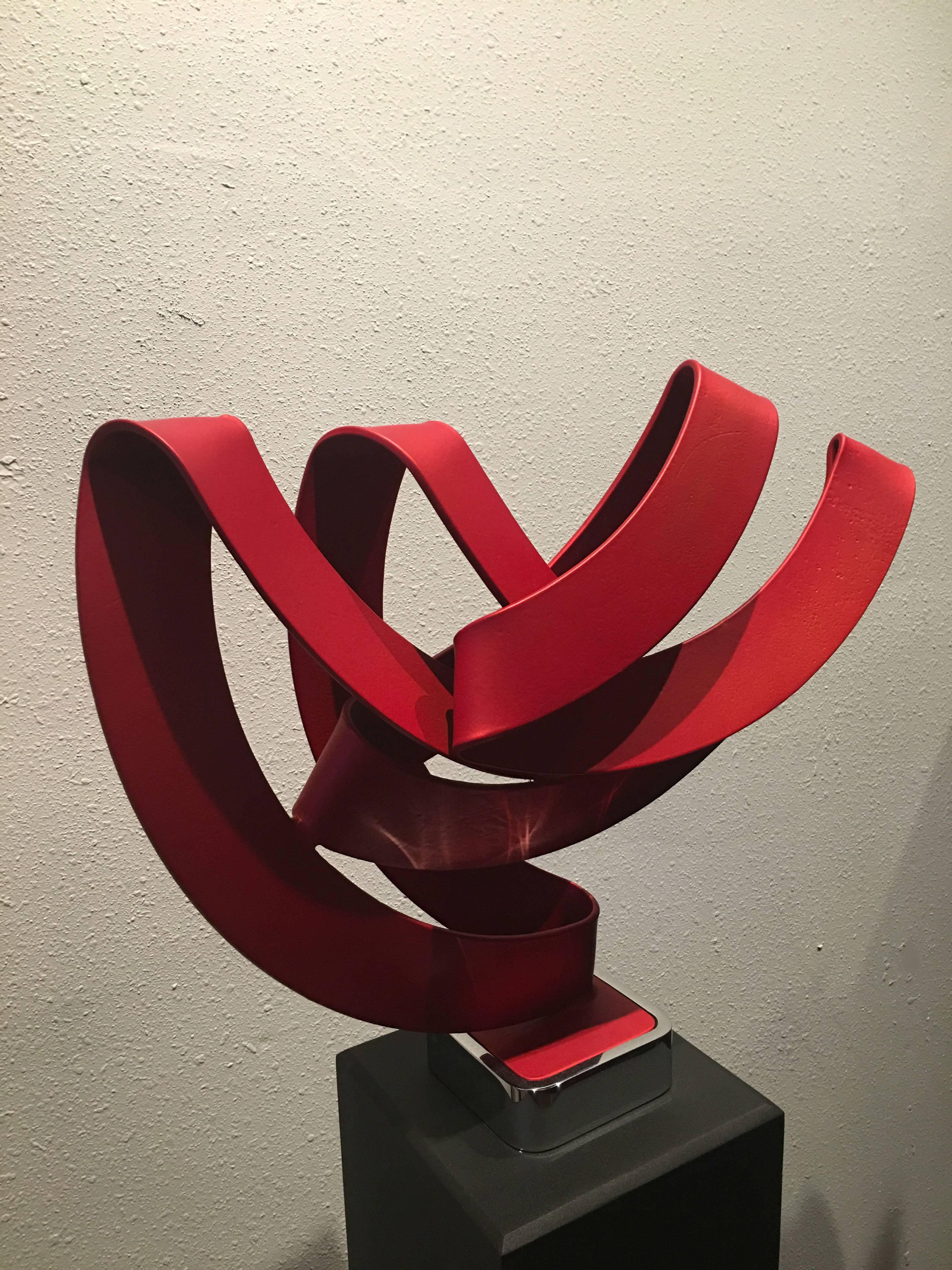 Blissful, 
18 x 22 x 5 inches, powder coated hand-fabricated steel chrome plated aluminum base
red chrome

Since 1979, Bret Price has built heating chambers around large pieces of steel, applying intense heat to manipulate metal to create a sense of
