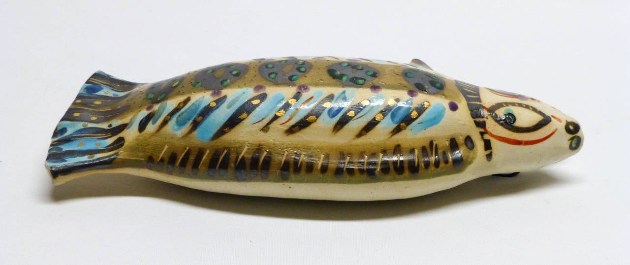 A very whimsical early sculptural wall vase in the form of a fish. Hand built porcelain with his very fun glaze decoration. He threw these in the 1980's.