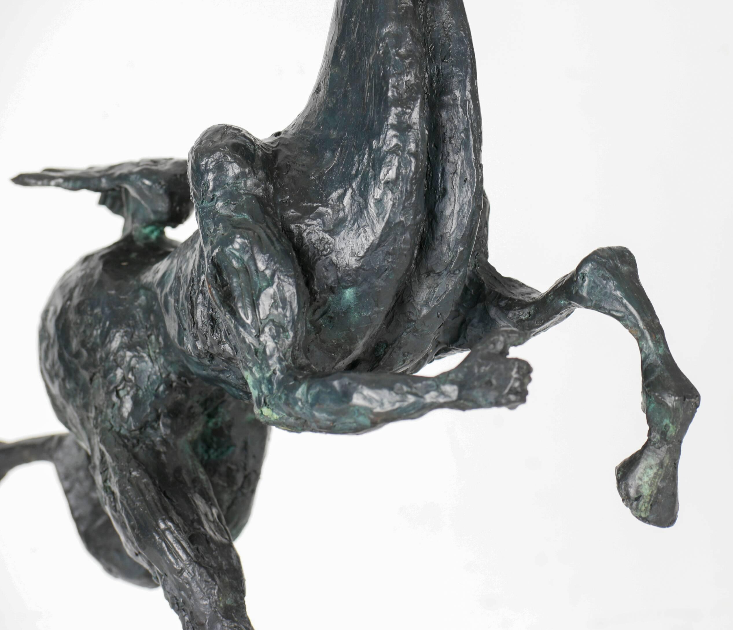 Original bronze sculpture by American sculptor David Huenergardt, part of an edition of only four. Signed Huenergardt; ©1977; and numbered 2/4;  Statue dimensions: 13 3/4 inches long, 12 inches high and 4 1/2 inches wide on an oil-finished,