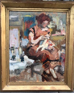 "Interior with young woman knitting"
