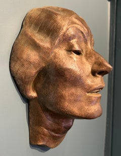 Retrato de dama en bronce