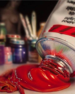 Photorealist red paint tube, "Studio VI", acrylic on cradled hardboard