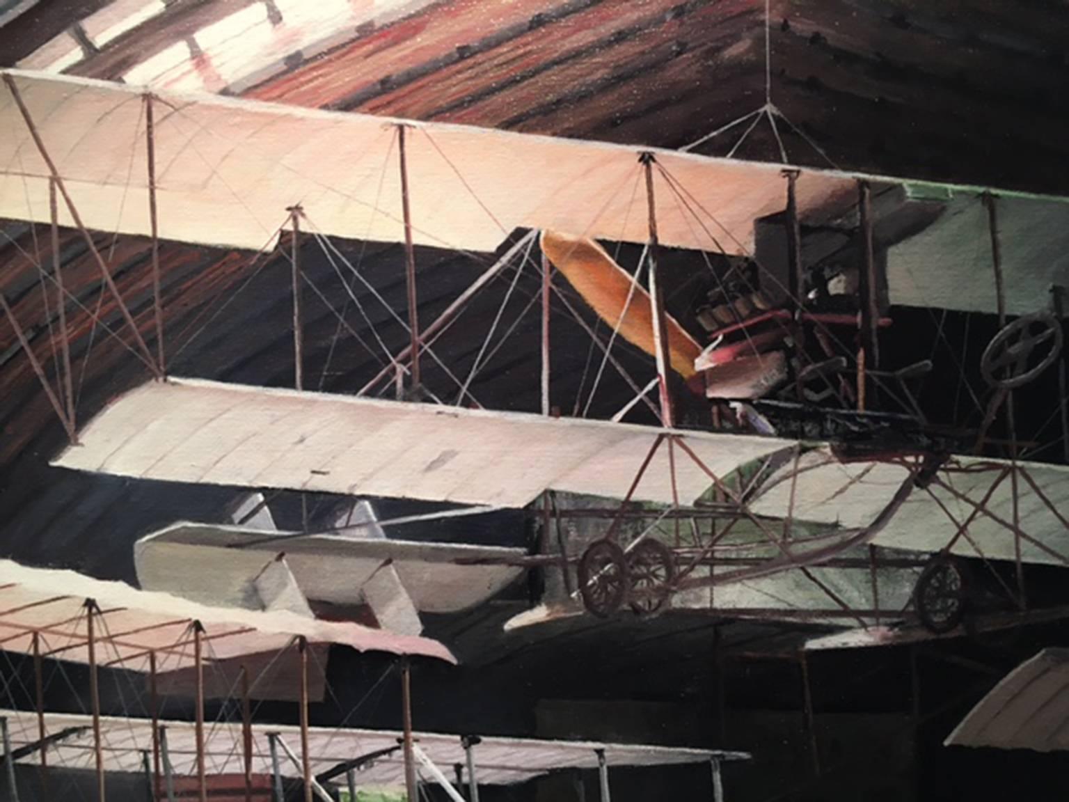 Residue is a medium sized photorealist painting. A man stands in the far end of a sunlit Aerodrome filled with vintage planes. In the way Hartley does best, hints of blues and greens shine through creating a soft effortless glow. Hartley often
