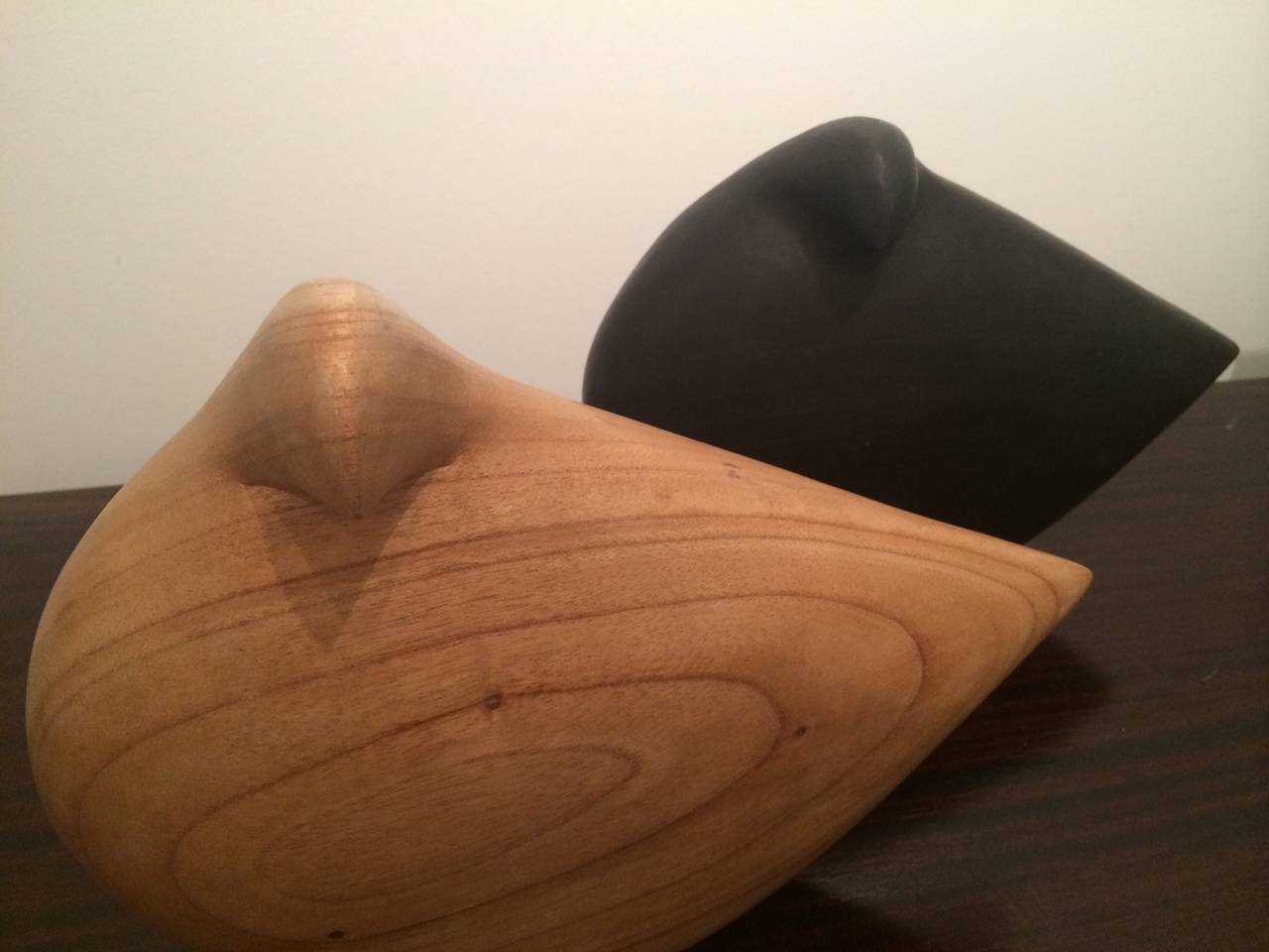 Sculptural wooden doves, symbols of peace. Because these are wood, the grain and pattern of the wood differs slightly from piece to piece.