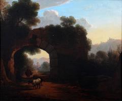 A drover with cattle under a ruined arch