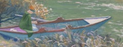 Eine junge Frau beim Fischen auf dem Fluss