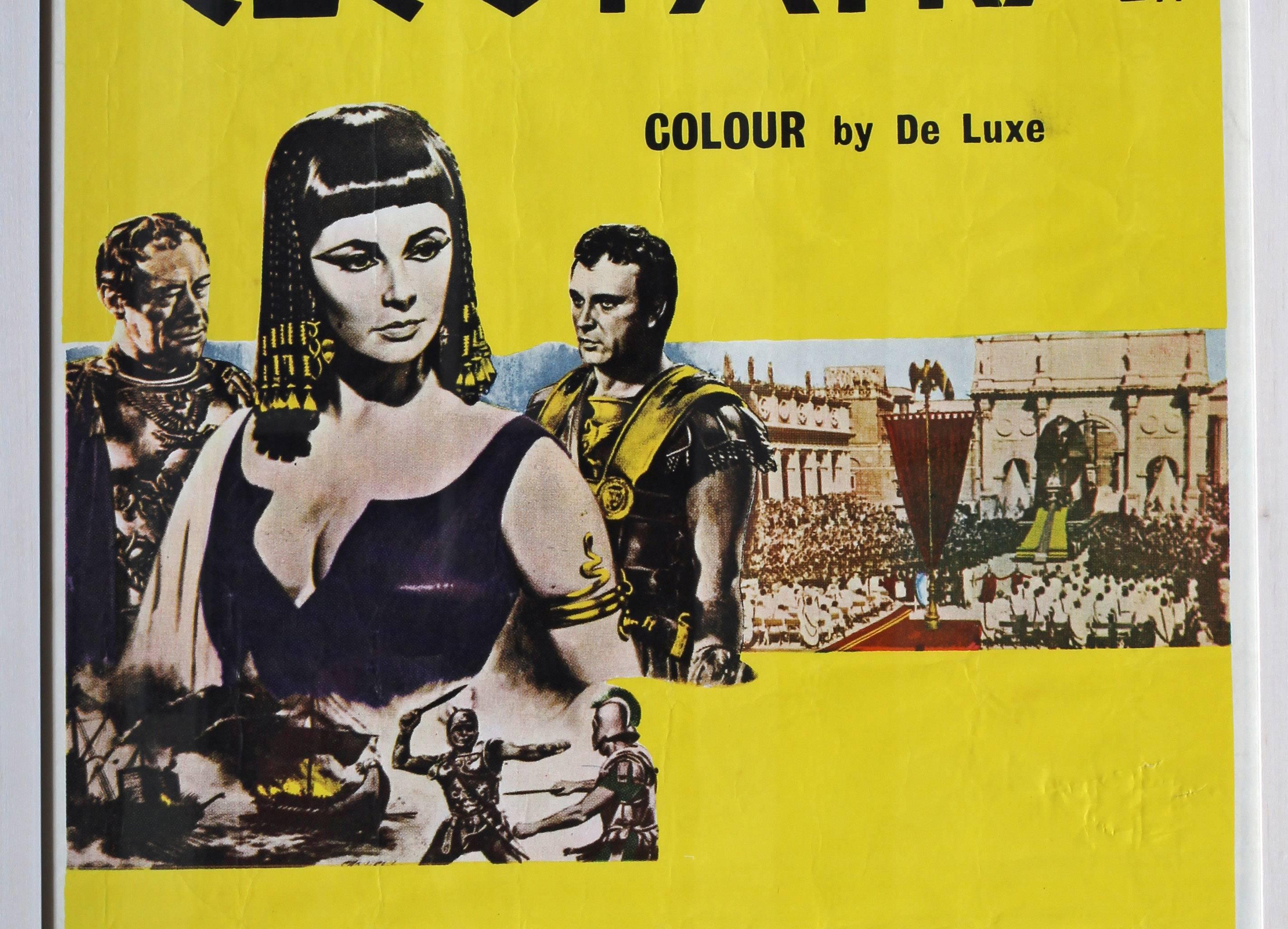 Original film poster of ‘Cleopatra’ starring Elizabeth Taylor and Richard Burton - Yellow Figurative Print by Unknown