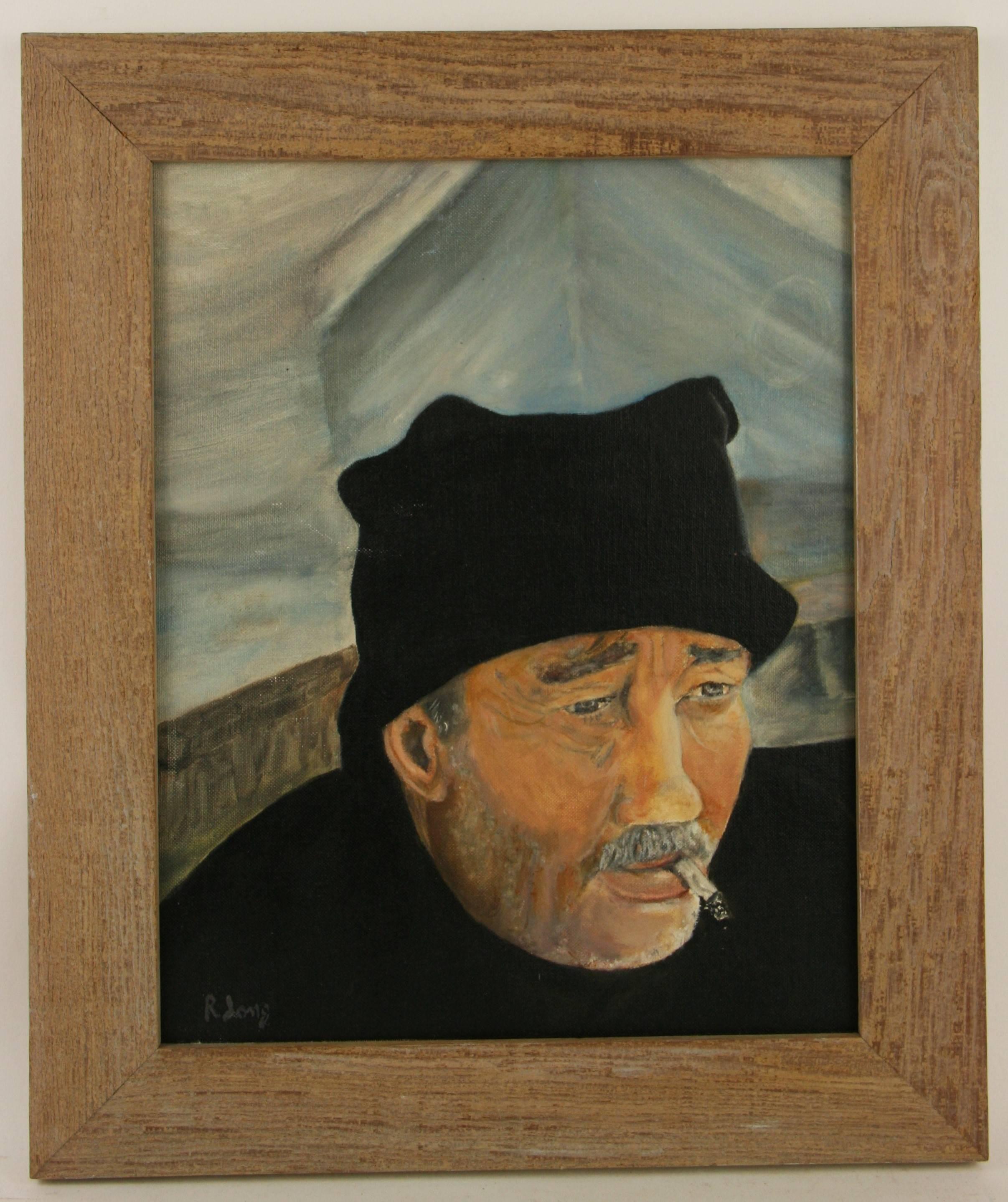 #5-2425 A sailors portrait,oil on artist board set in a natural wood frame.Signed lower left by R.Long