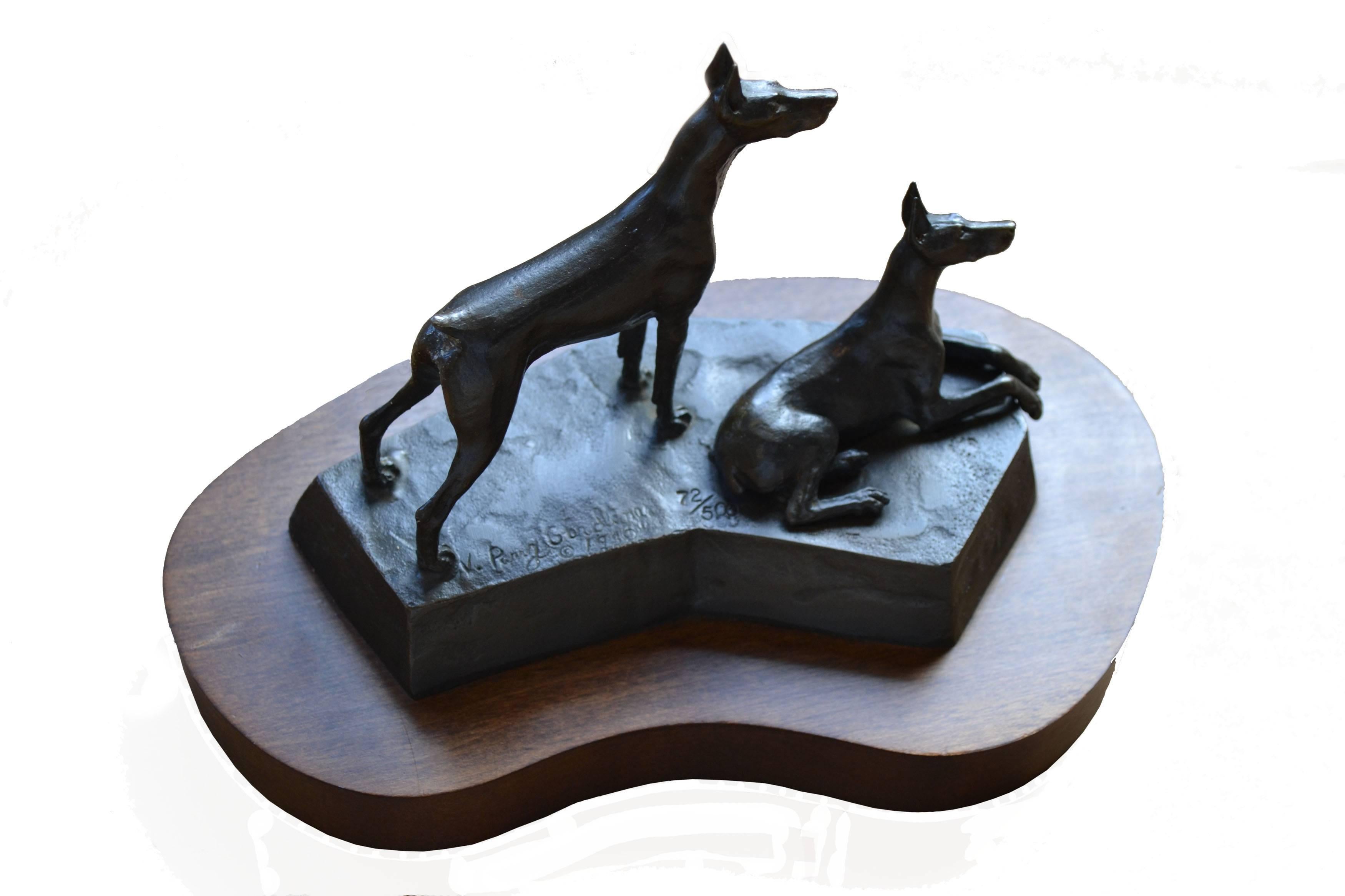 Two Dobermans - Sculpture by Virginia Perry Gardiner