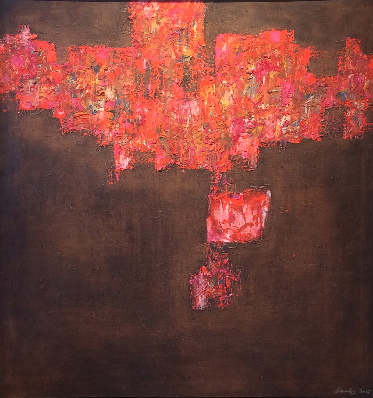 This Modern abstract oil painting on canvas by Stanley Bate is a large, bold piece. It features deep, earthy browns and a very bright red, textured and organic shape that spans the top part of the composition and moves slightly further down it at