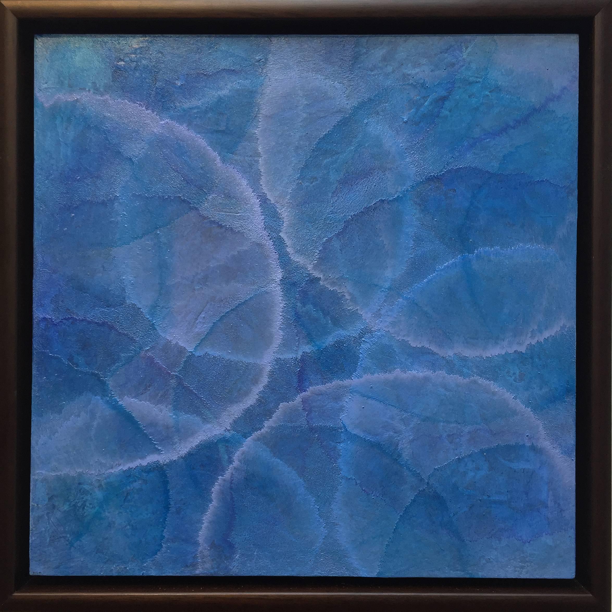 This small framed abstract painting by Roger Mudre features a cool blue palette, with subtle outlines of circles in purple and light blue, layered over one another. The painting is 12" x 12" and 13.5" x 13.5" framed. It is professionally framed in a