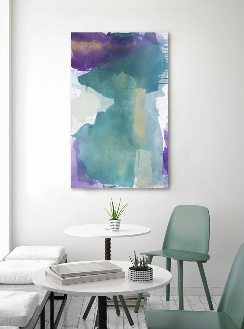 This abstract contemporary painting by Julia Contacessi is made with acrylic paint on canvas. It features a colorful palette, with muted green, purple, and white layered together with thin brushes of metallic gold overtop. It is wired and ready to