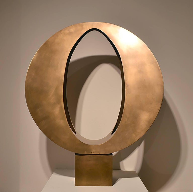 Large bronze sculpture in "O" shape by Doris Totten Chase

(April 1923 – December 2008)
Doris Chase had her first solo exhibition in 1956 and her first international showing in Rome in 1962. Her artwork flowed through different mediums: painting