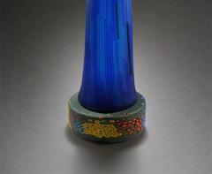 IN THE GARDEN - blown glass sculpture of female figure with flowers on base