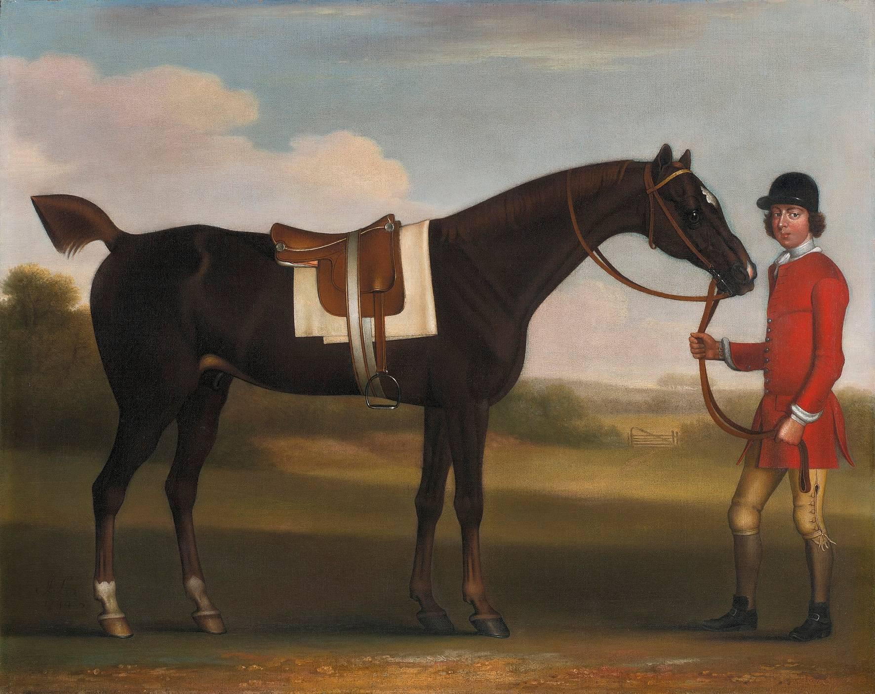 James Seymour Animal Painting - A DARK BAY HORSE HELD BY A LIVERIED GROOM IN A LANDSCAPE