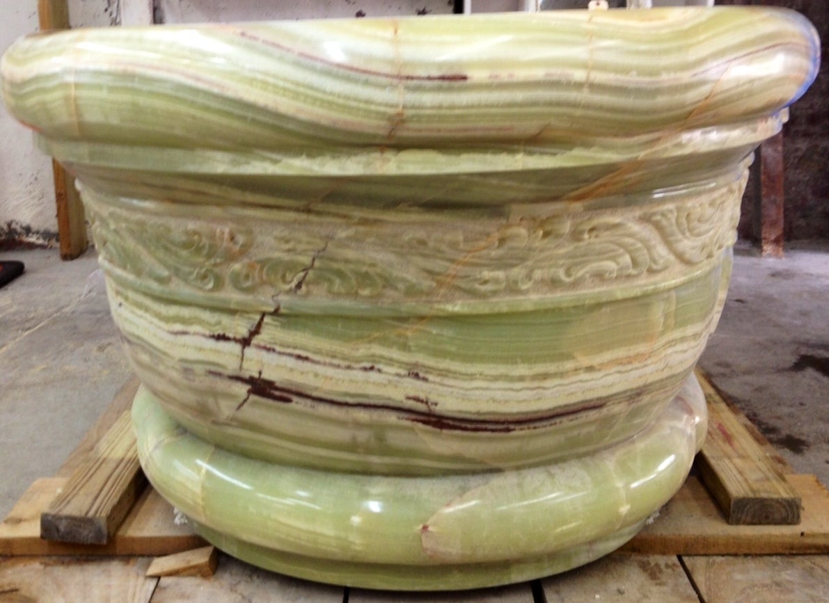 Hand sculpted green onyx bath tub