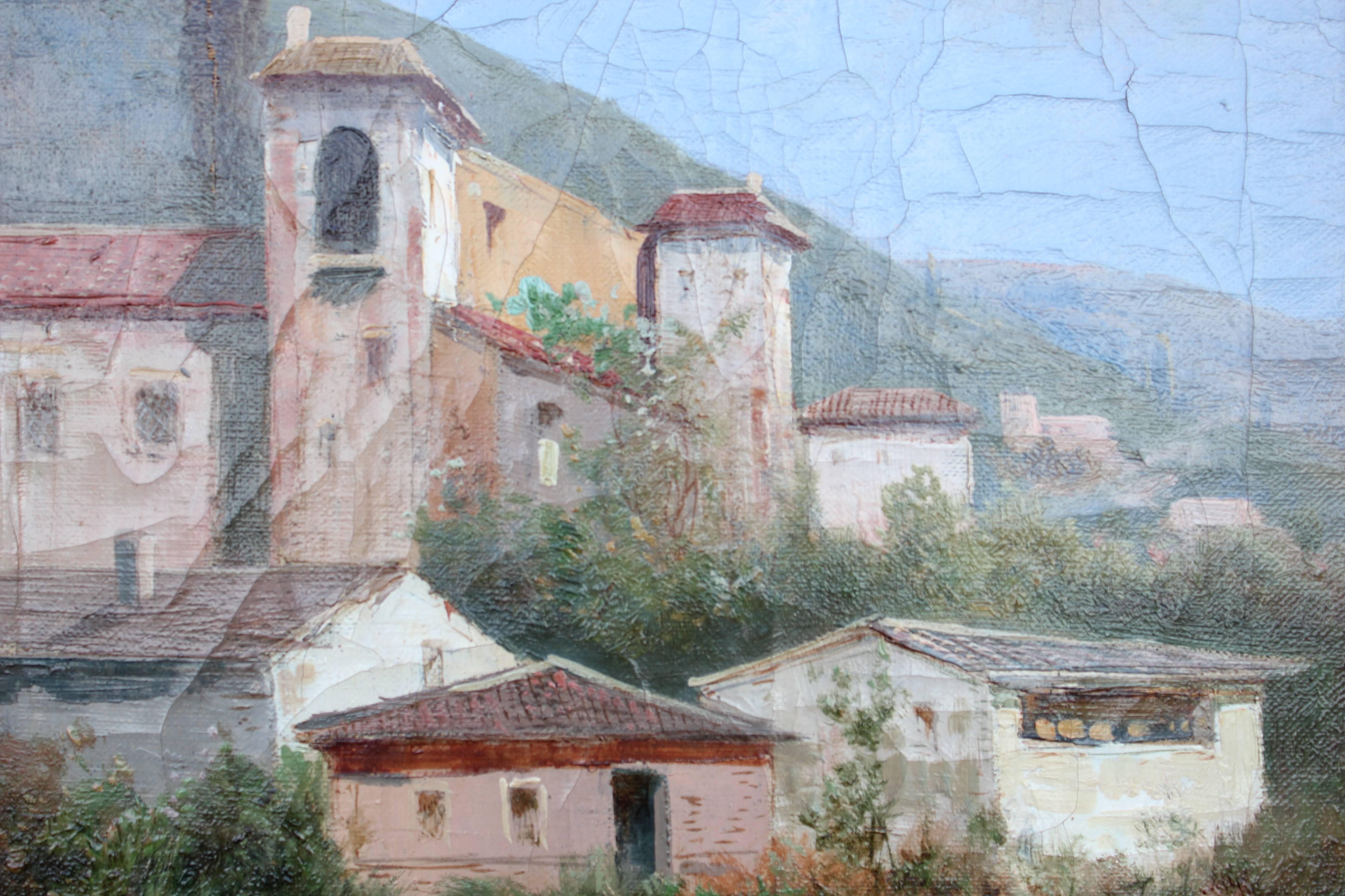 South American or Central American townscape with hills in the background and a figure walking along a street. The work has a Hertz Art Gallery stamp on the back of the framed canvas. It is framed in a decorative gold frame. The painting is signed