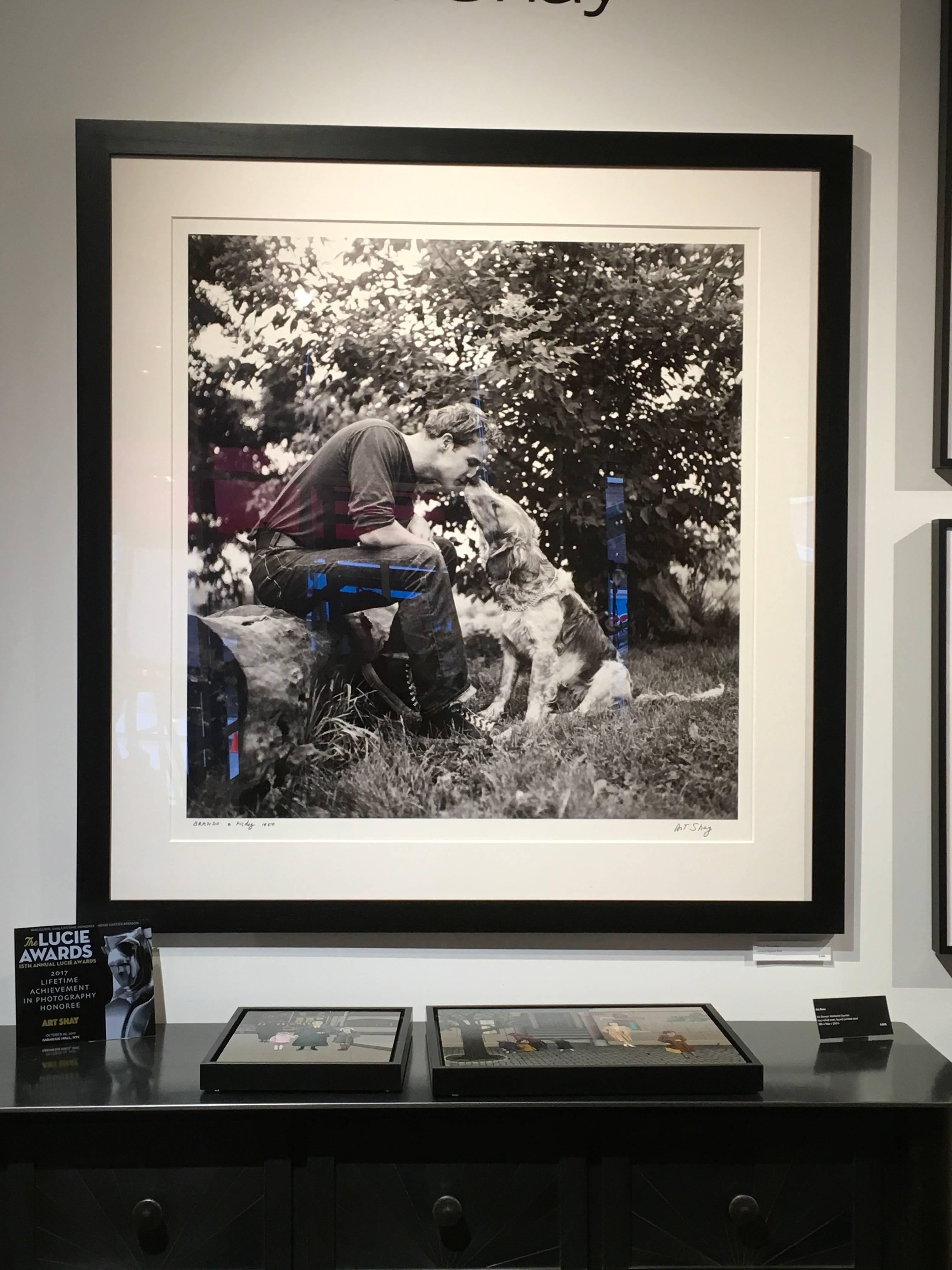 Marlon Brando Kissing Dog, Libertyville, IL 1950 - Large Format Black & White - Photograph by Art Shay