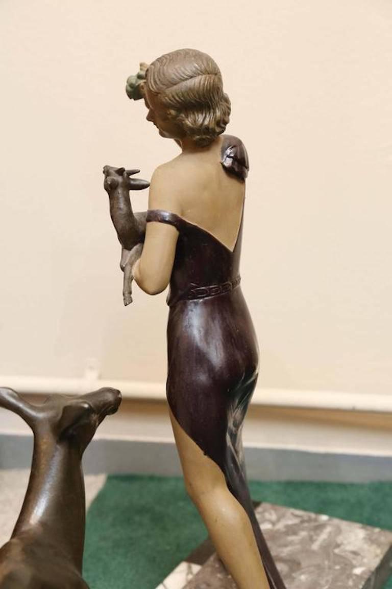 The sculpture is composed from figures, made out of spelter and marble base. French, circa 1930s.
 Condition is very good.
 Measures: 23.5