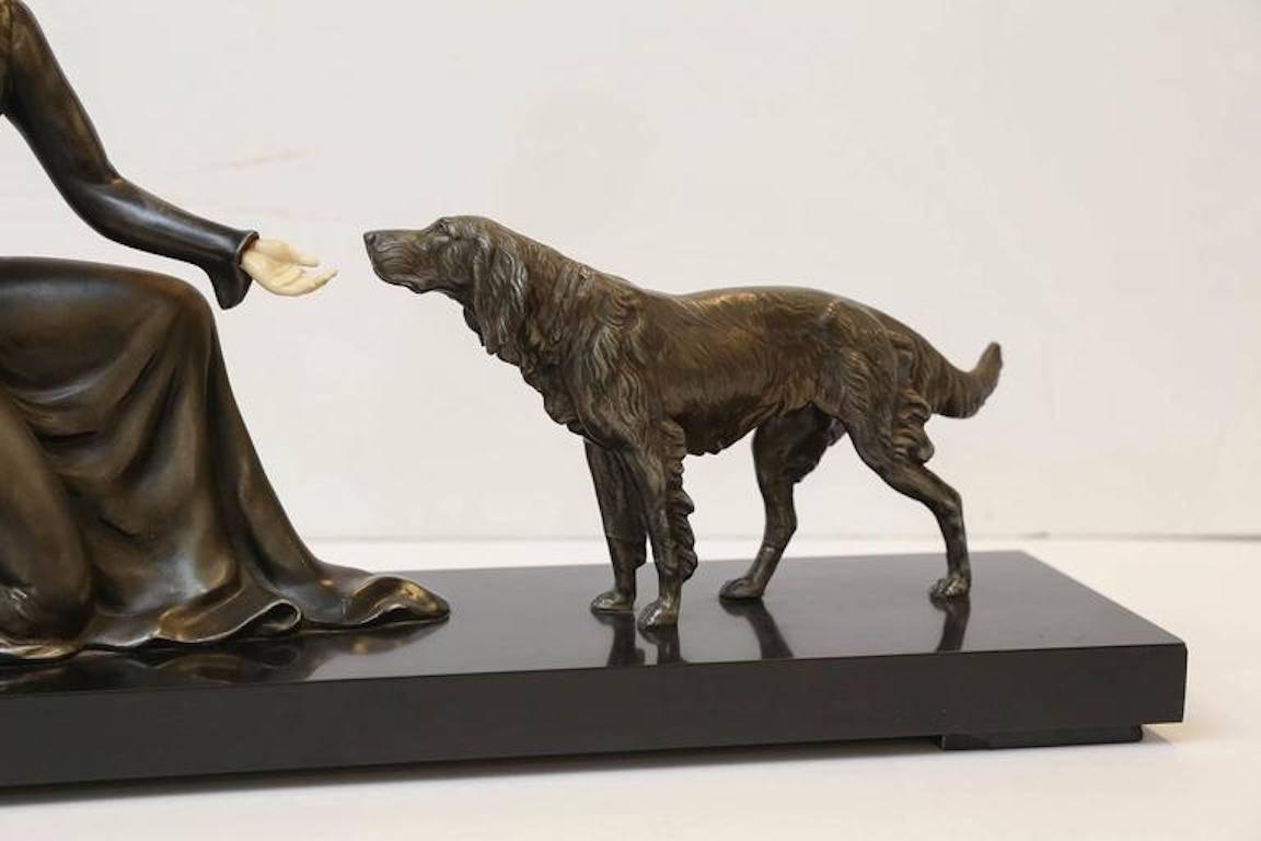 Lady and a Dog - Art Deco Sculpture by Unknown