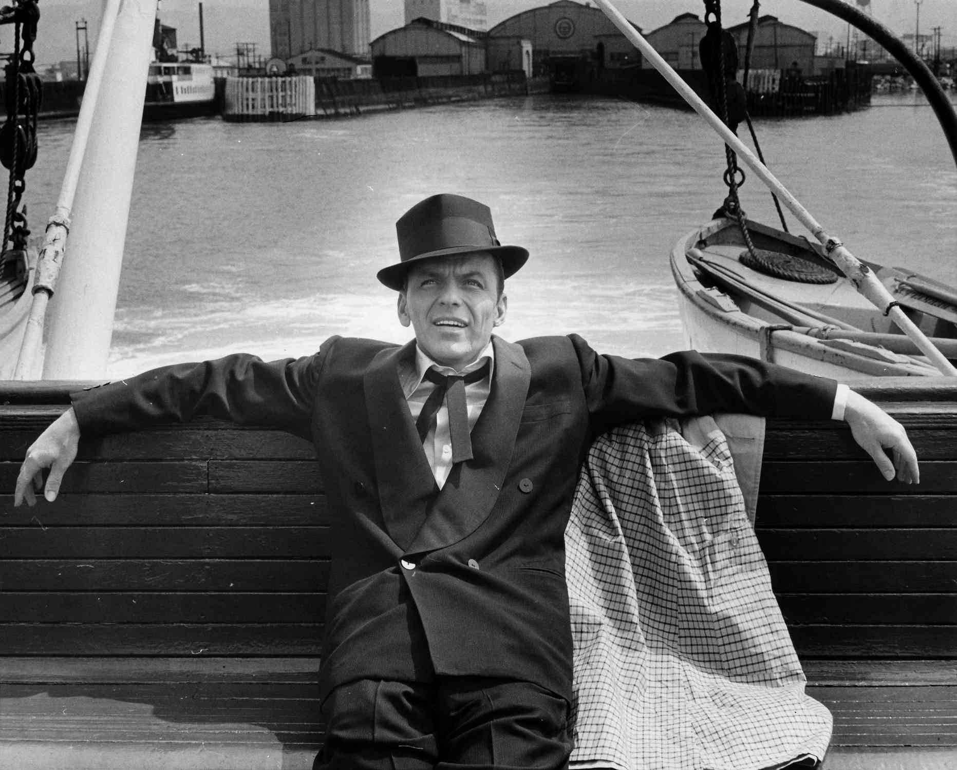 Unknown Portrait Photograph - Frank Sinatra Sitting on Bench Fine Art Print